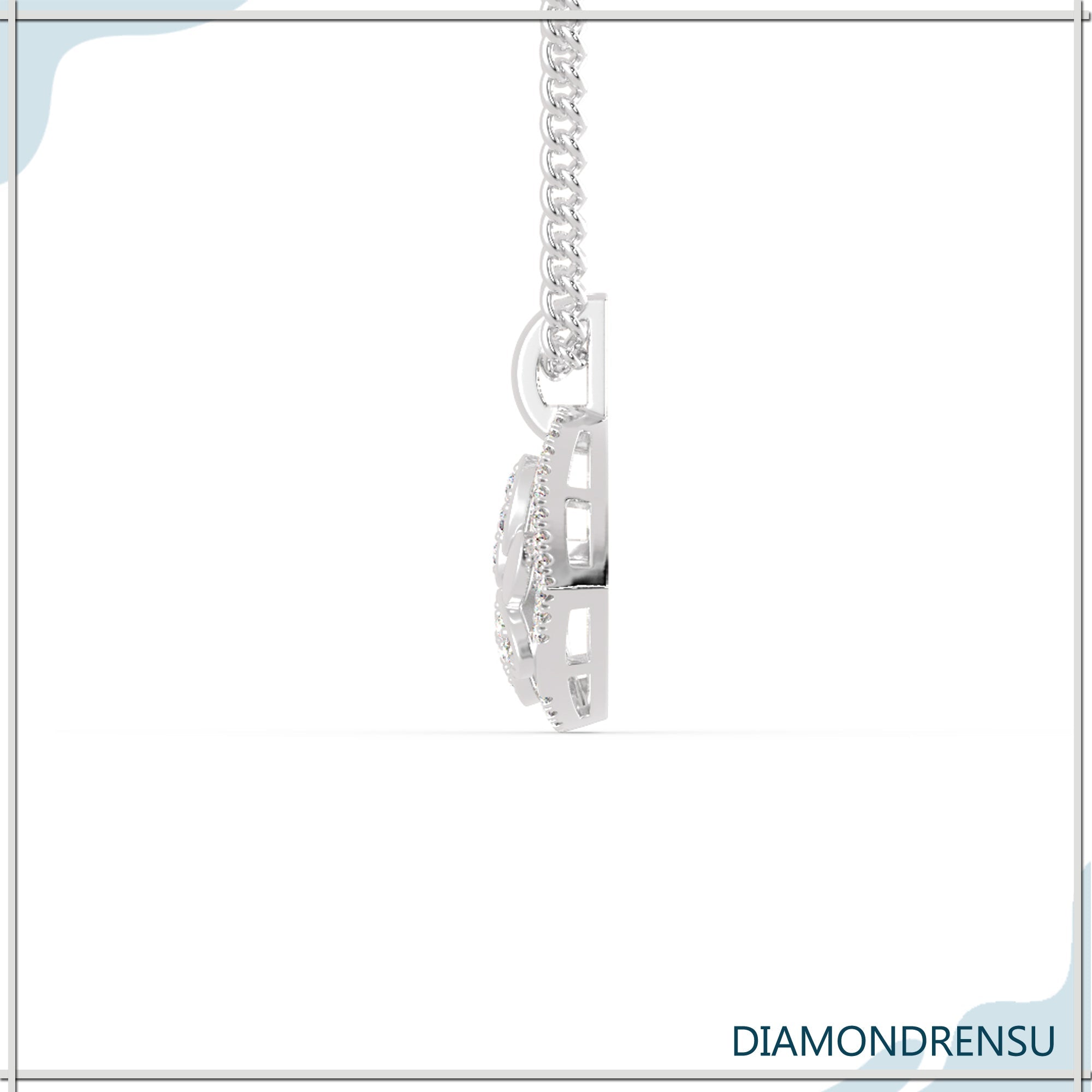 Paw pendant with lab grown diamond in white gold setting.