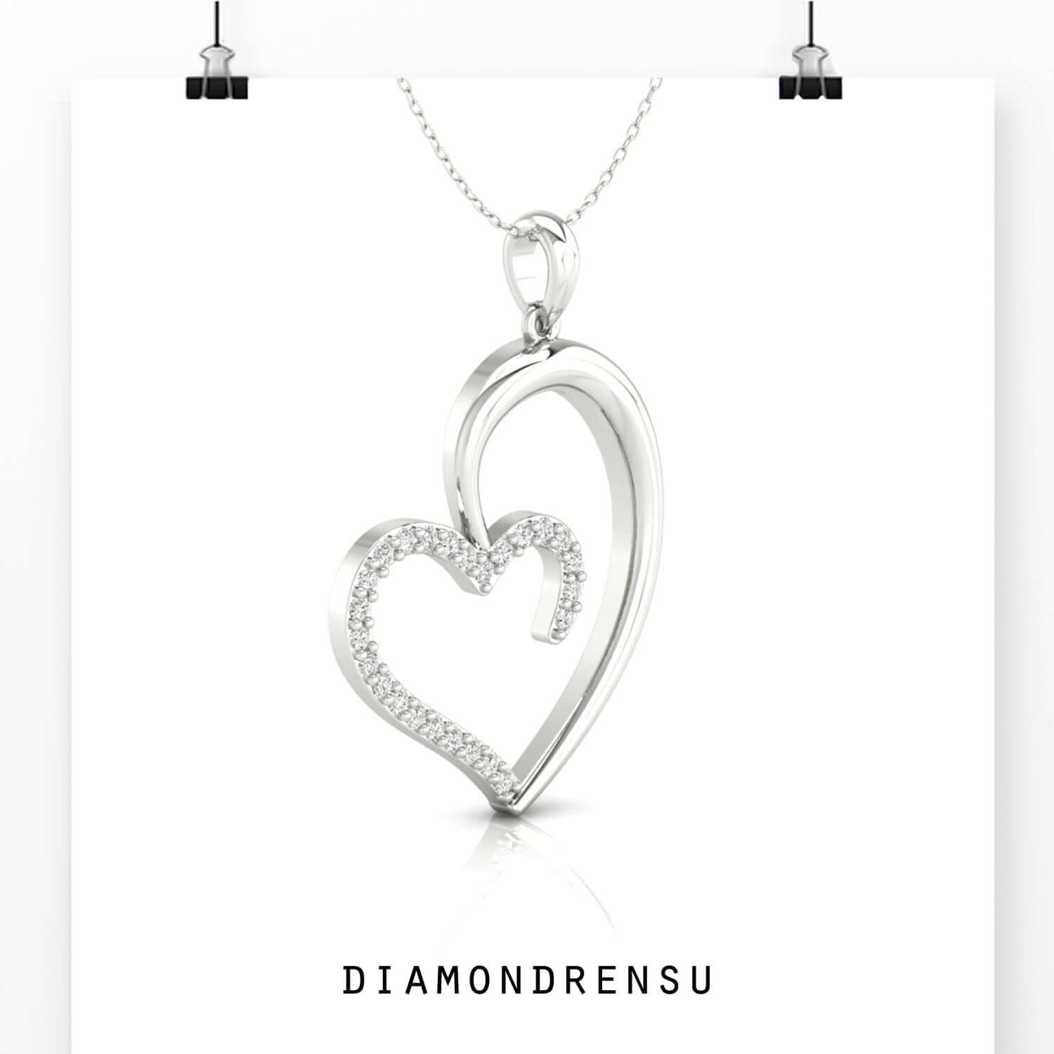 Heart on pendant crafted in yellow gold with fine detailing.