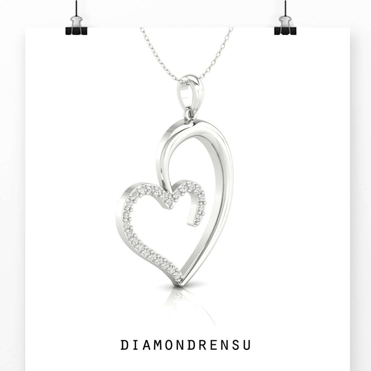 Heart on pendant crafted in yellow gold with fine detailing.