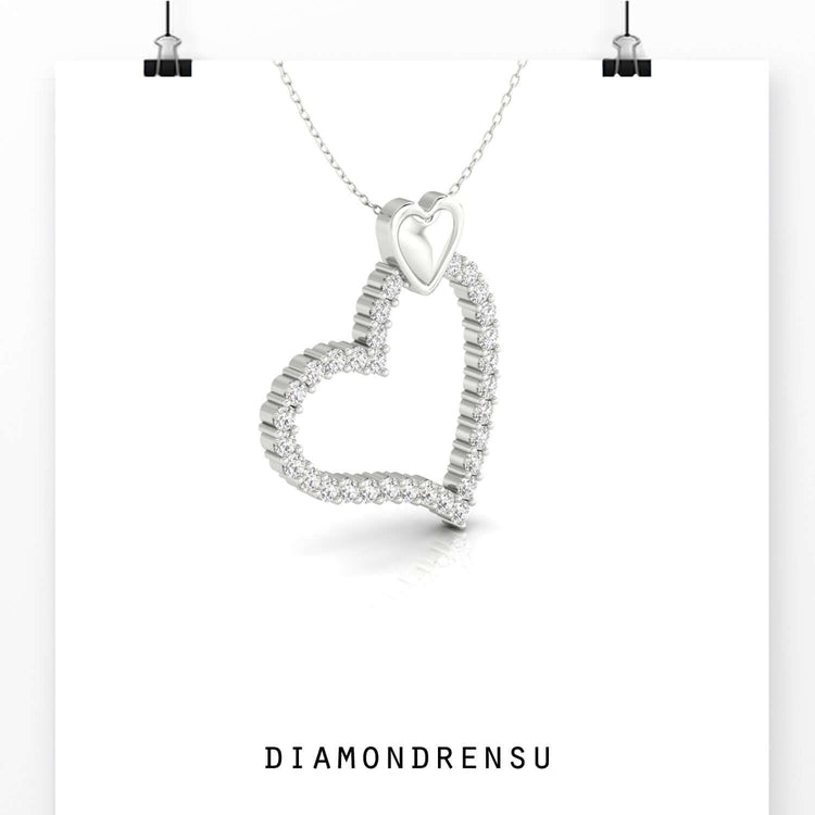 Stylish heart shape pendant in rose gold with sparkling centre.