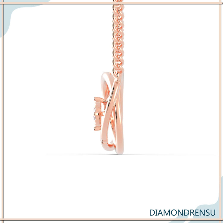 Interlocking design pendant in gold with handmade craftsmanship.