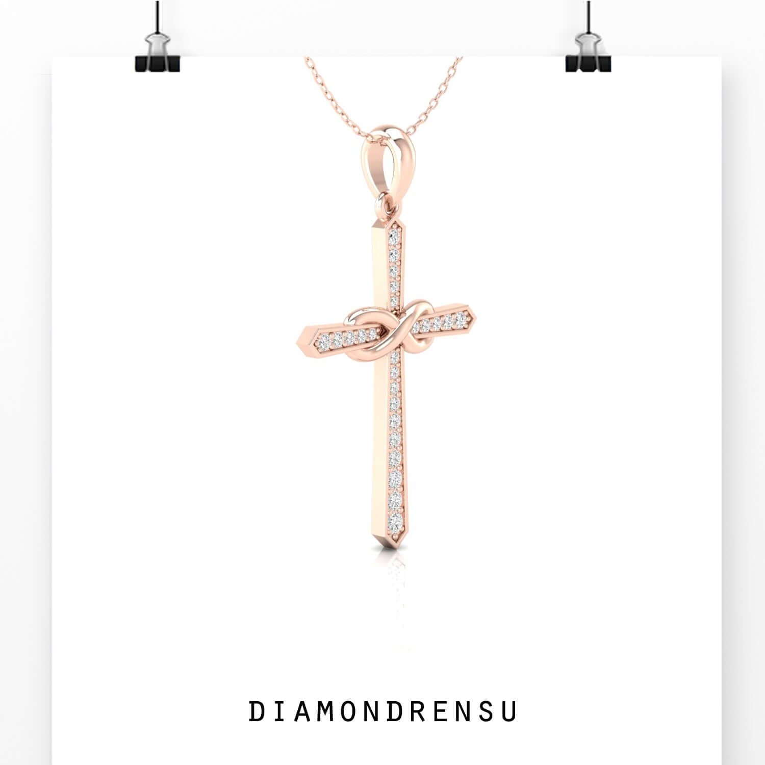 Elegant round diamond pendant in infinity shape with gold setting.