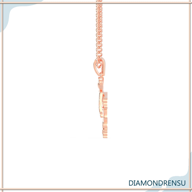 Unique pendant in rose gold with angel motif.