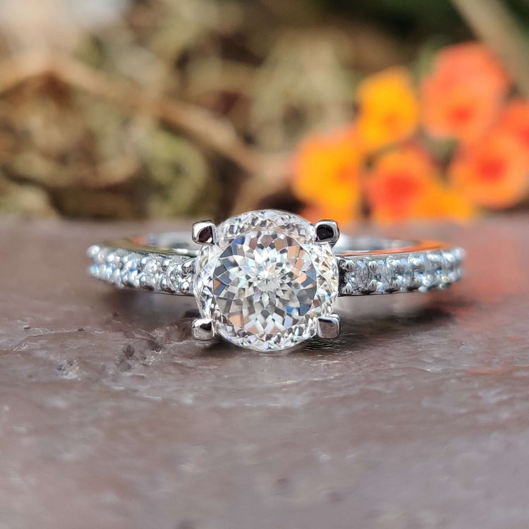 Portuguese cut moissanite engagement ring in white gold.