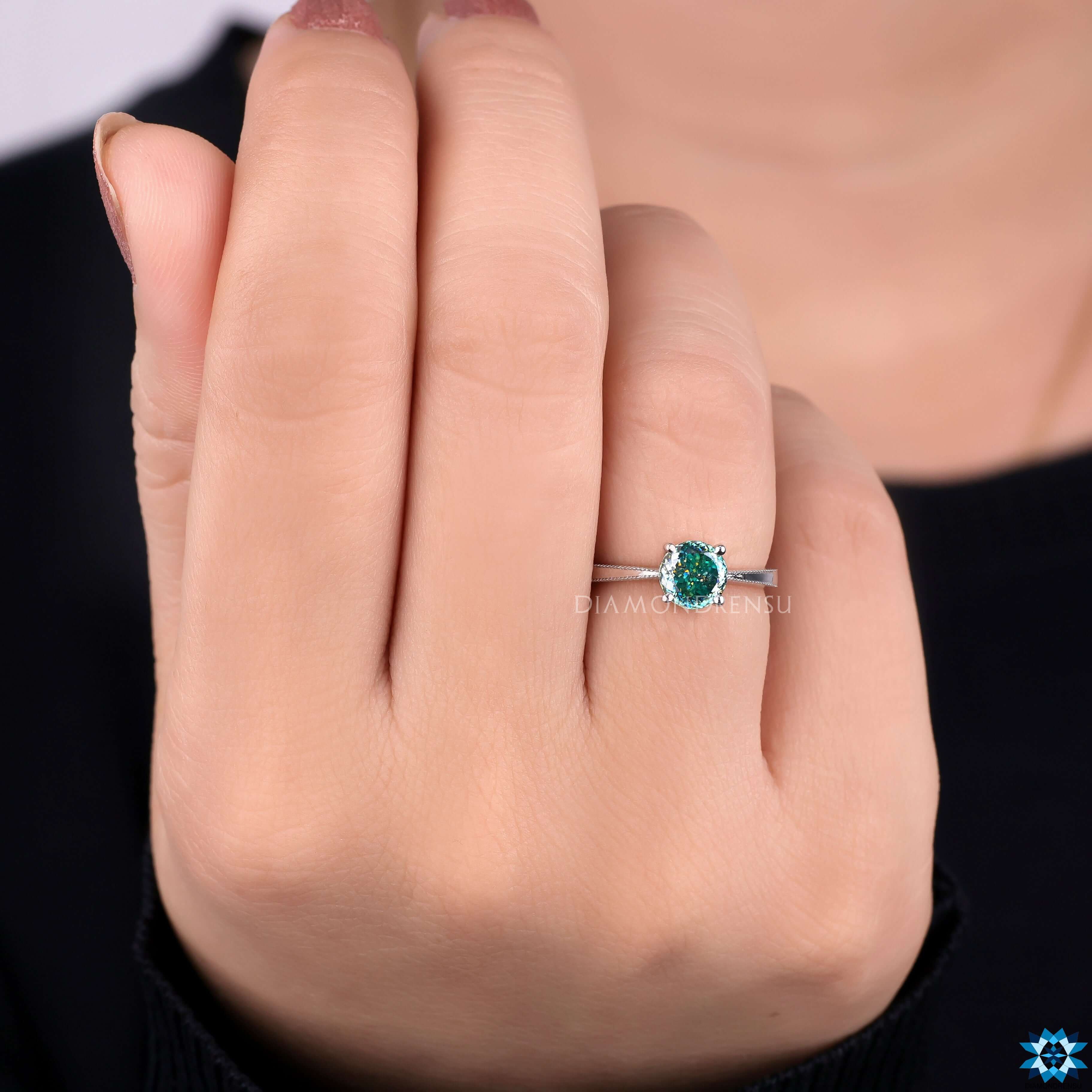 Handmade moissanite ring with prong setting.
