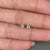 Round cut lab diamond earrings in rose gold.
