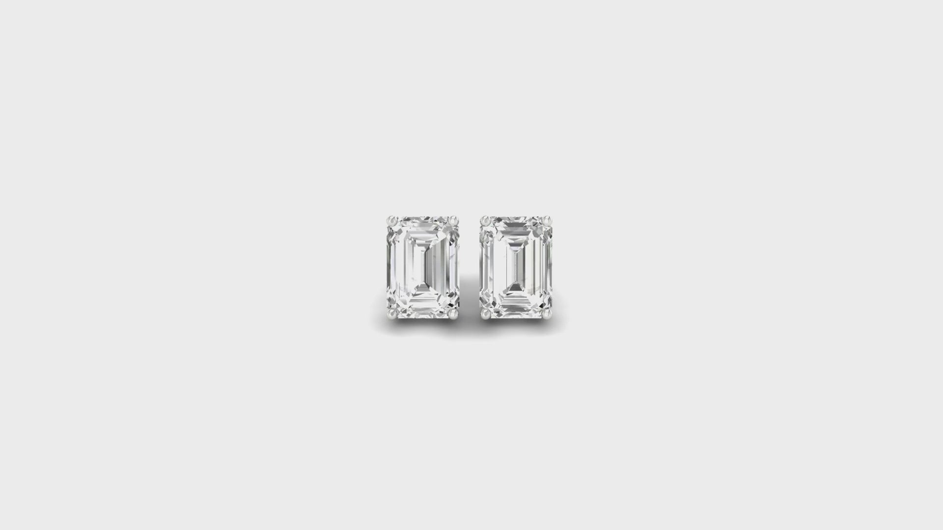 Lab grown diamond earrings in emerald cut finish.