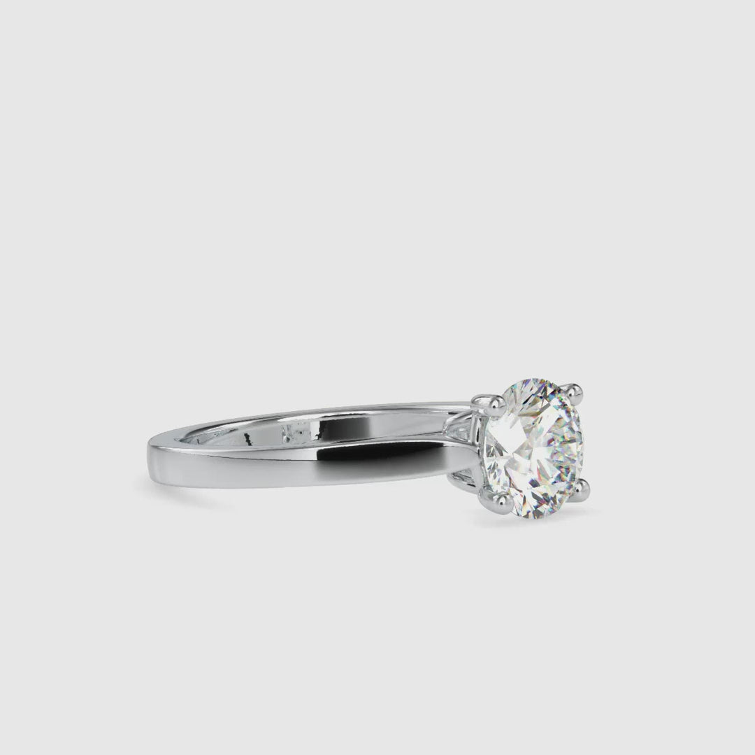 Solitaire diamond engagement ring with round cut and gold option.