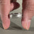Half eternity mens ring crafted in white gold with a brushed finish.