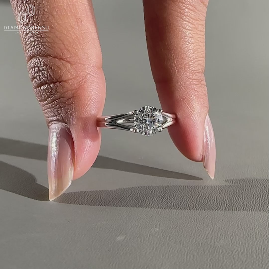 The white gold ring features a split shank design.