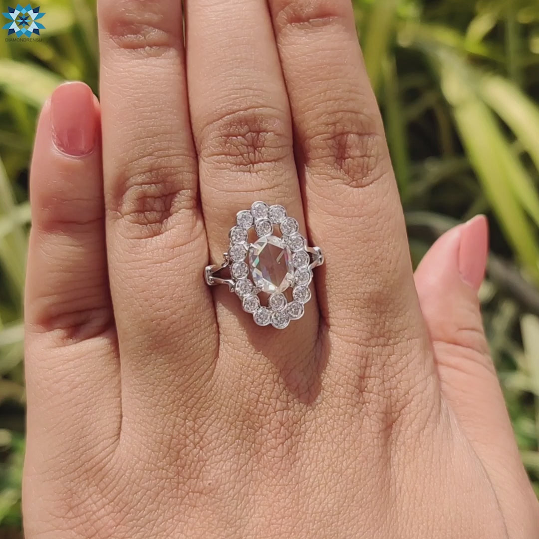 Handmade jewellery in white gold with vintage halo moissanite.