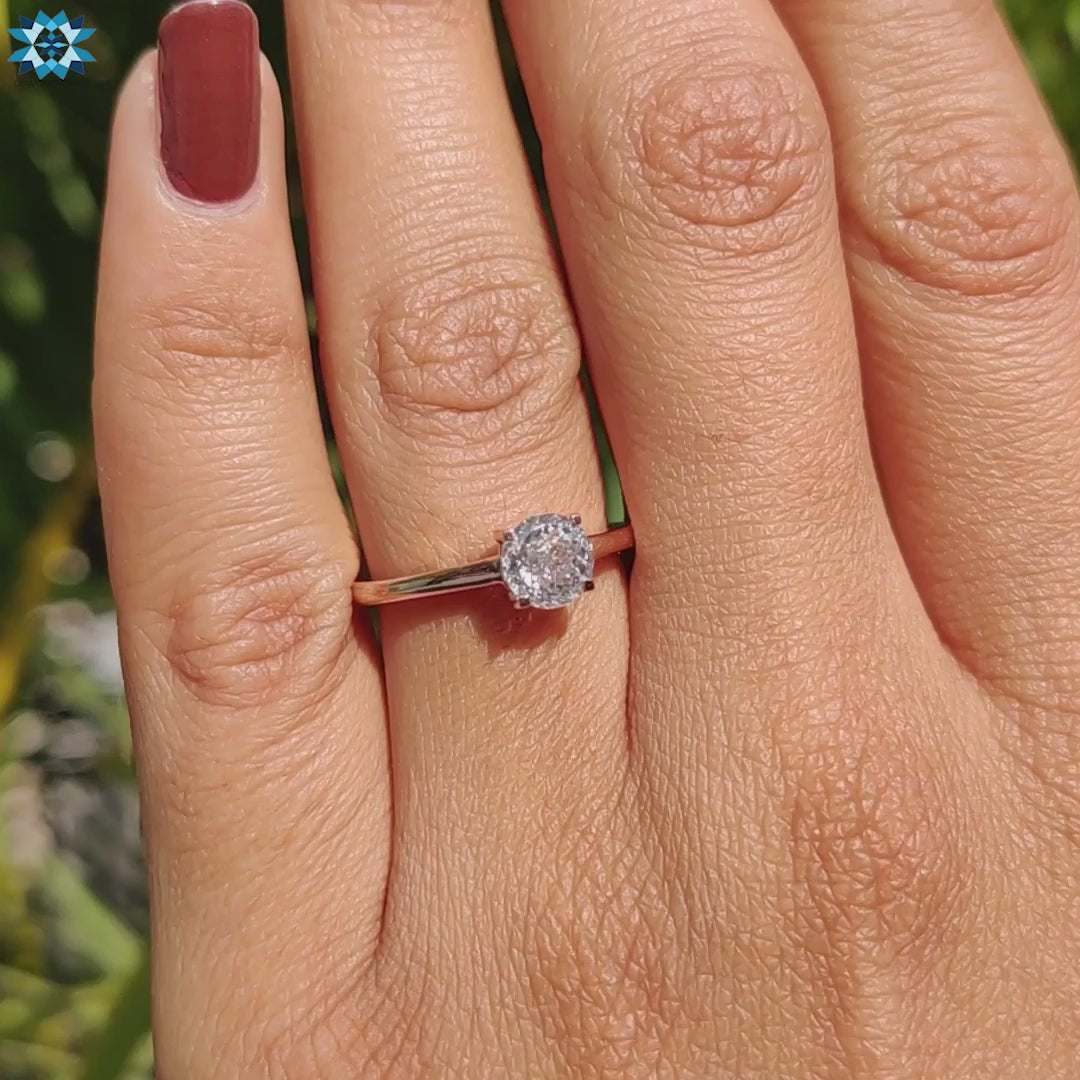 Minimalist Portuguese cut engagement ring.