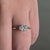East west engagement ring with an east west diamond ring design, creating a striking and sophisticated look.