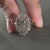 Round ring diamond paired with a diamond ring radiant cut style