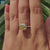 White gold engagement ring with hidden halo and knife edge band.