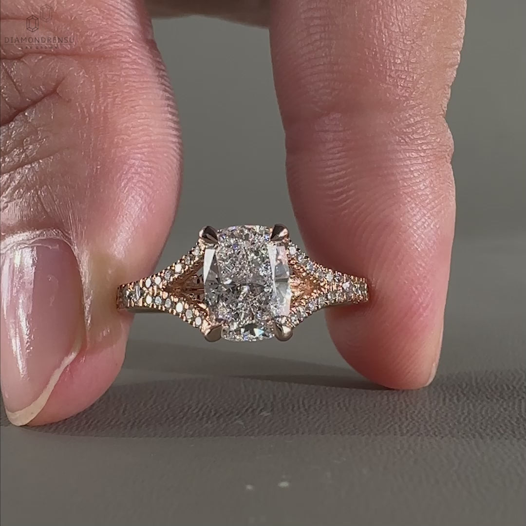 UK engagement ring crafted with a cushion cut diamond elongated design and claw prong setting for elegance.