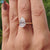 Handmade jewelry with pear shaped moissanite and hidden halo.