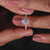 Halo engagement rings with pave diamonds and a pear shaped diamond, perfect as a diamond ring uk gift.