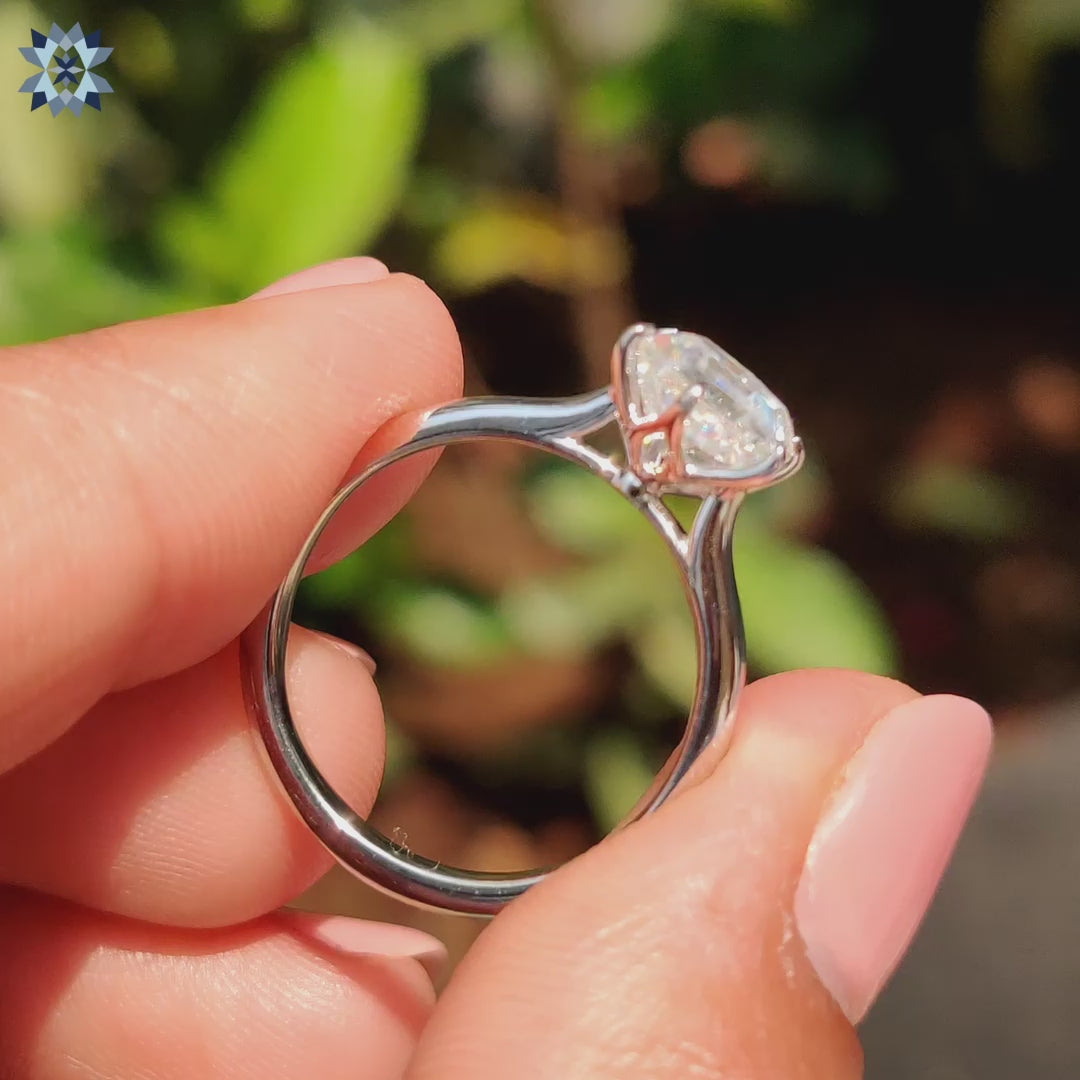 Solitaire setting ring featuring a hexagon moissanite centre stone.