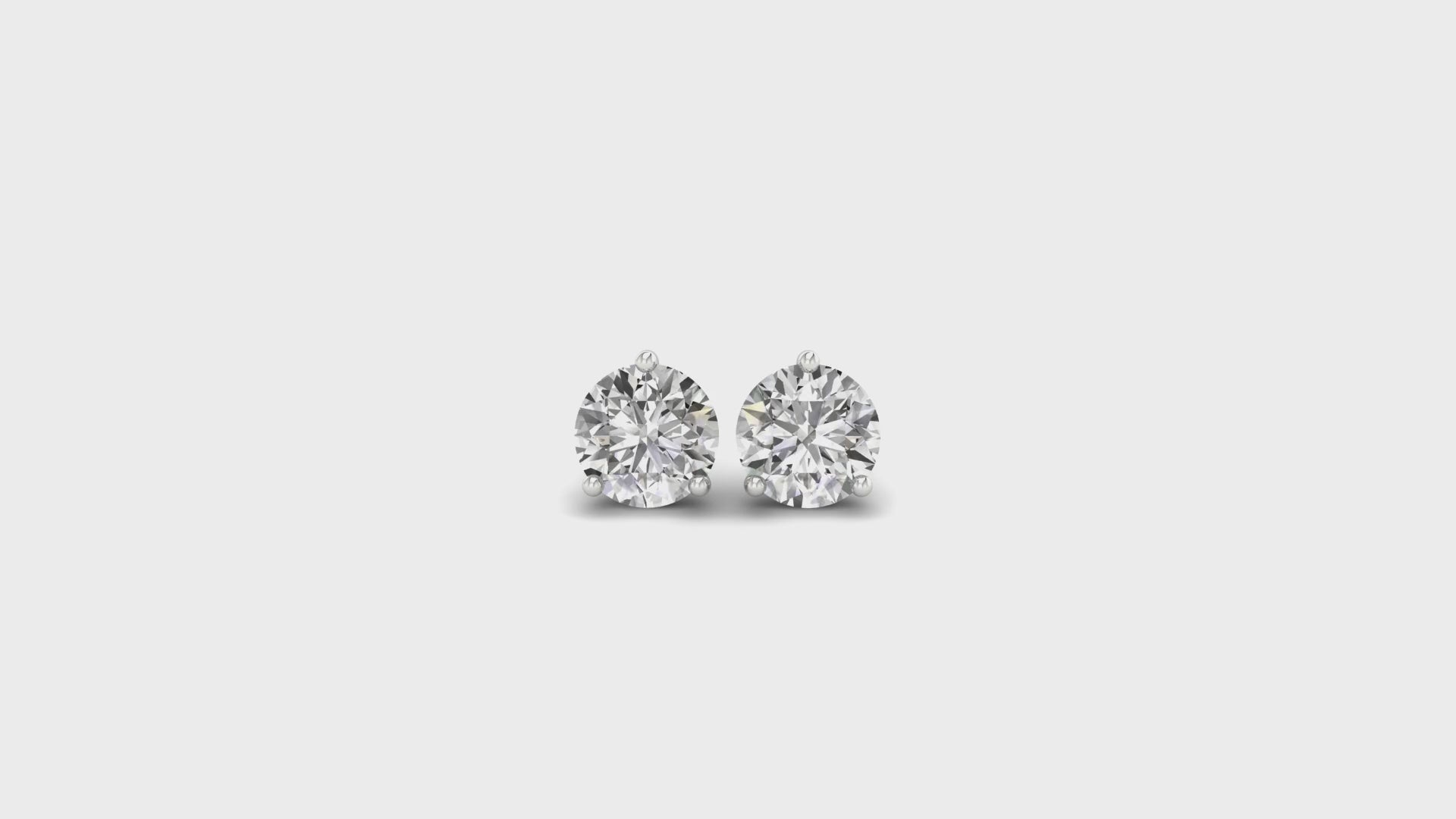 White gold diamond earrings in classic martini style.