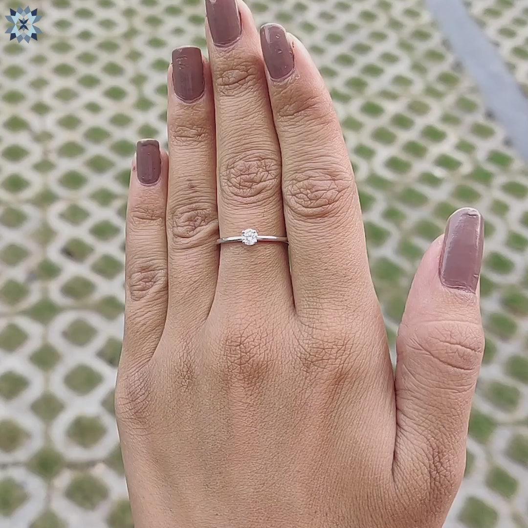Diamondrensu UK handmade round engagement ring.