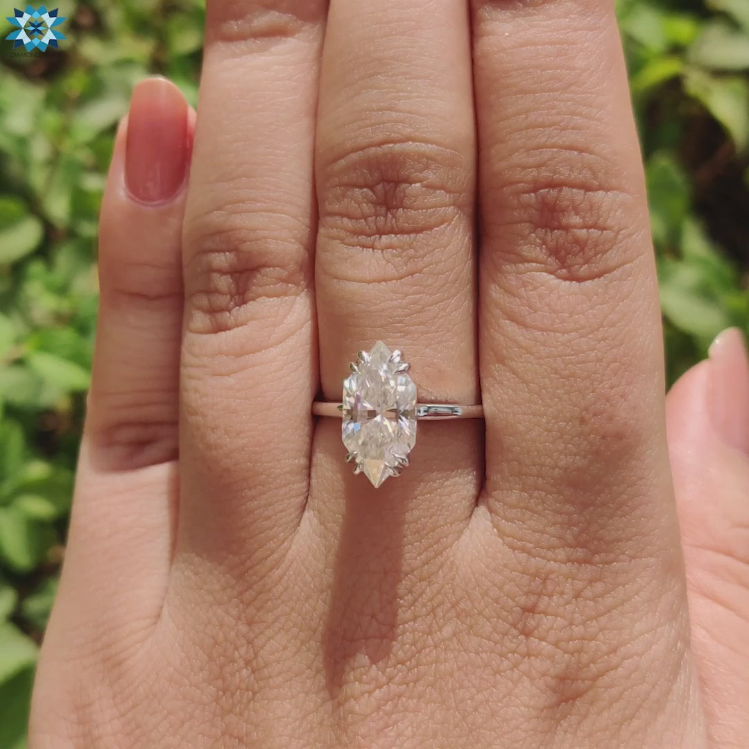 Diamondrensu UK Dutch marquise engagement ring.