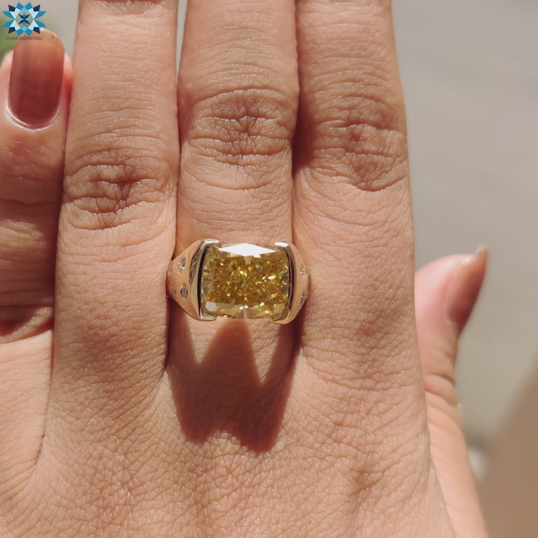 Elegant cathedral ring with canary yellow moissanite and tapered shank.