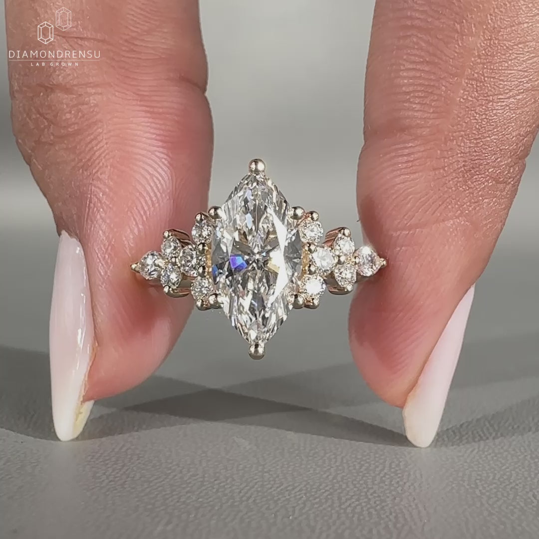 Cluster diamond ring set in yellow gold.