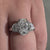 Double claw prong oval engagement ring with three stone ring design, a truly unique engagement ring for women.