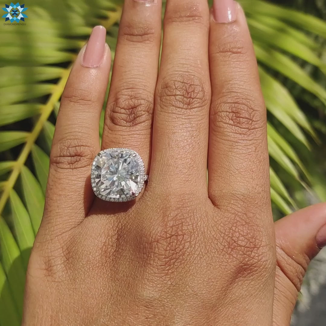 Elegant halo setting ring with cushion moissanite.