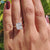 Four prong solitaire ring in two-tone gold.