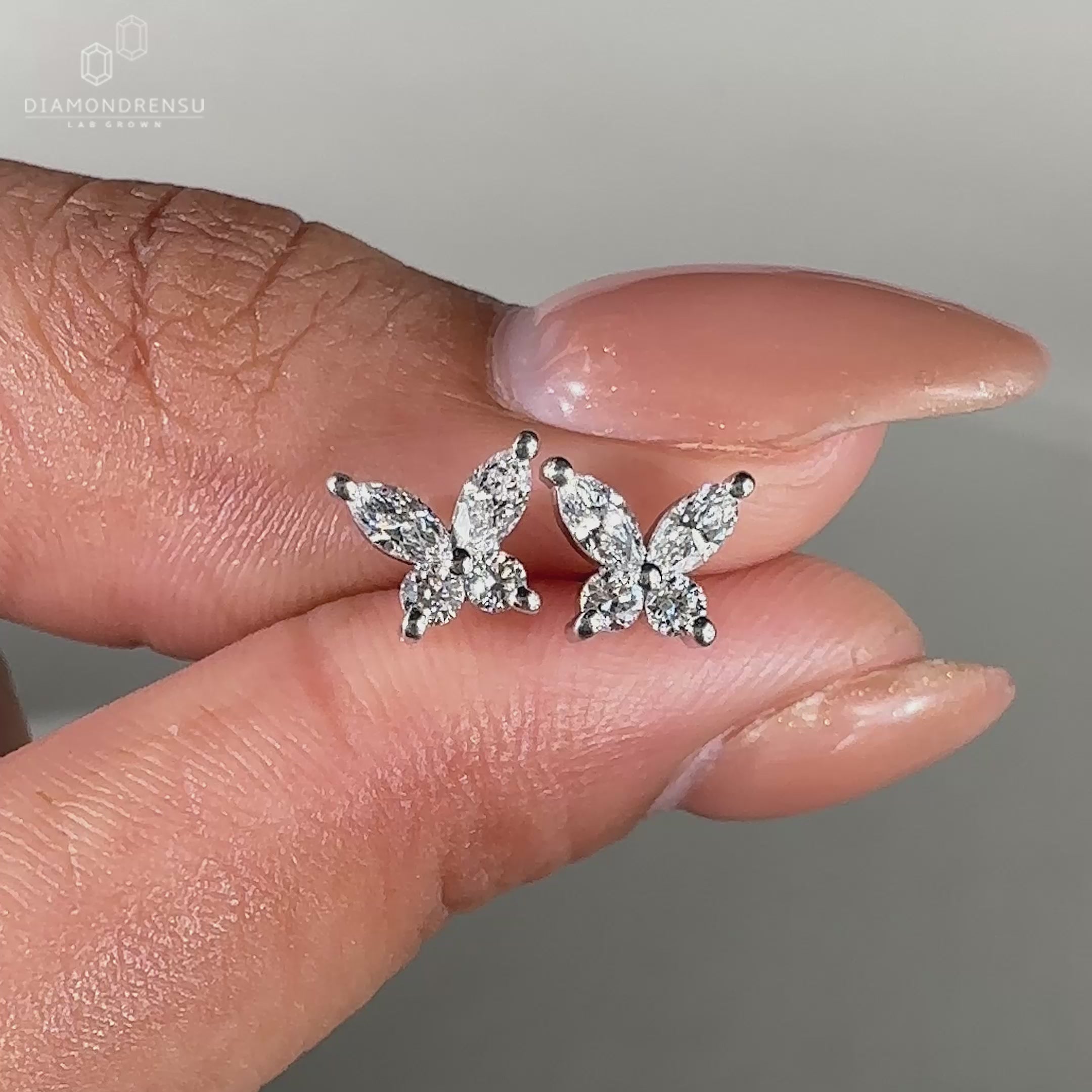 Marquise and round diamond earrings.