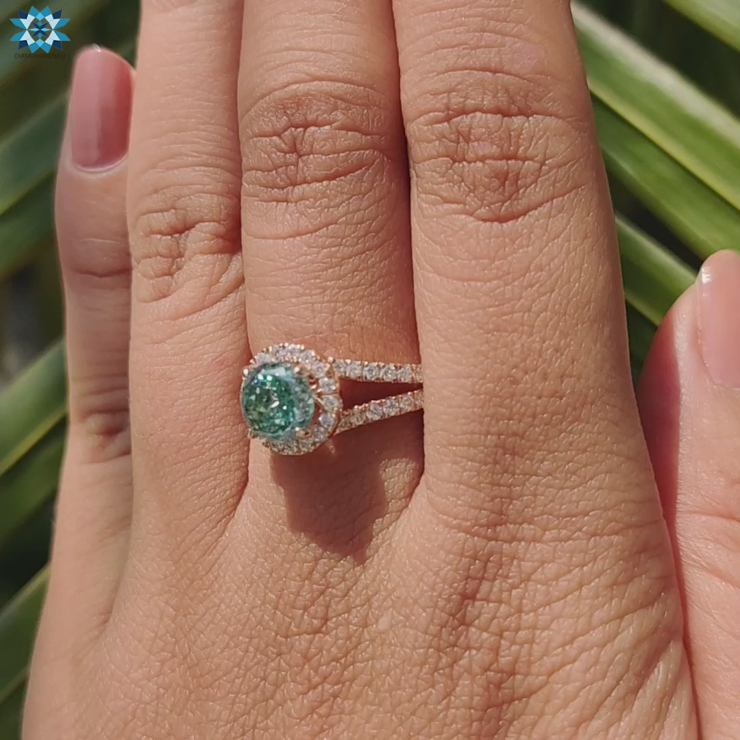 Round moissanite ring with split shank.