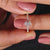 Engagement ring with pave diamonds and handmade jewellery detailing for a truly unique piece.