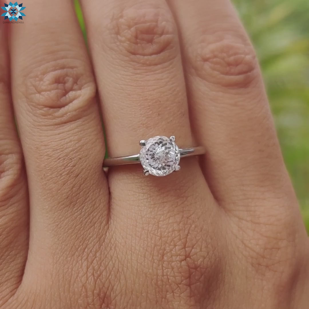 Buy custom solitaire moissanite ring in white gold.