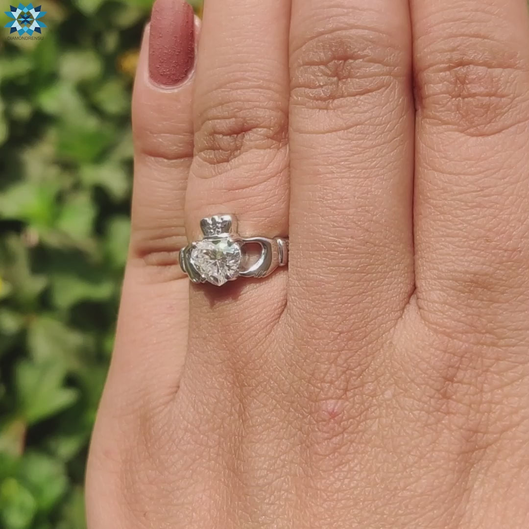 Custom moissanite engagement ring with heart shape.