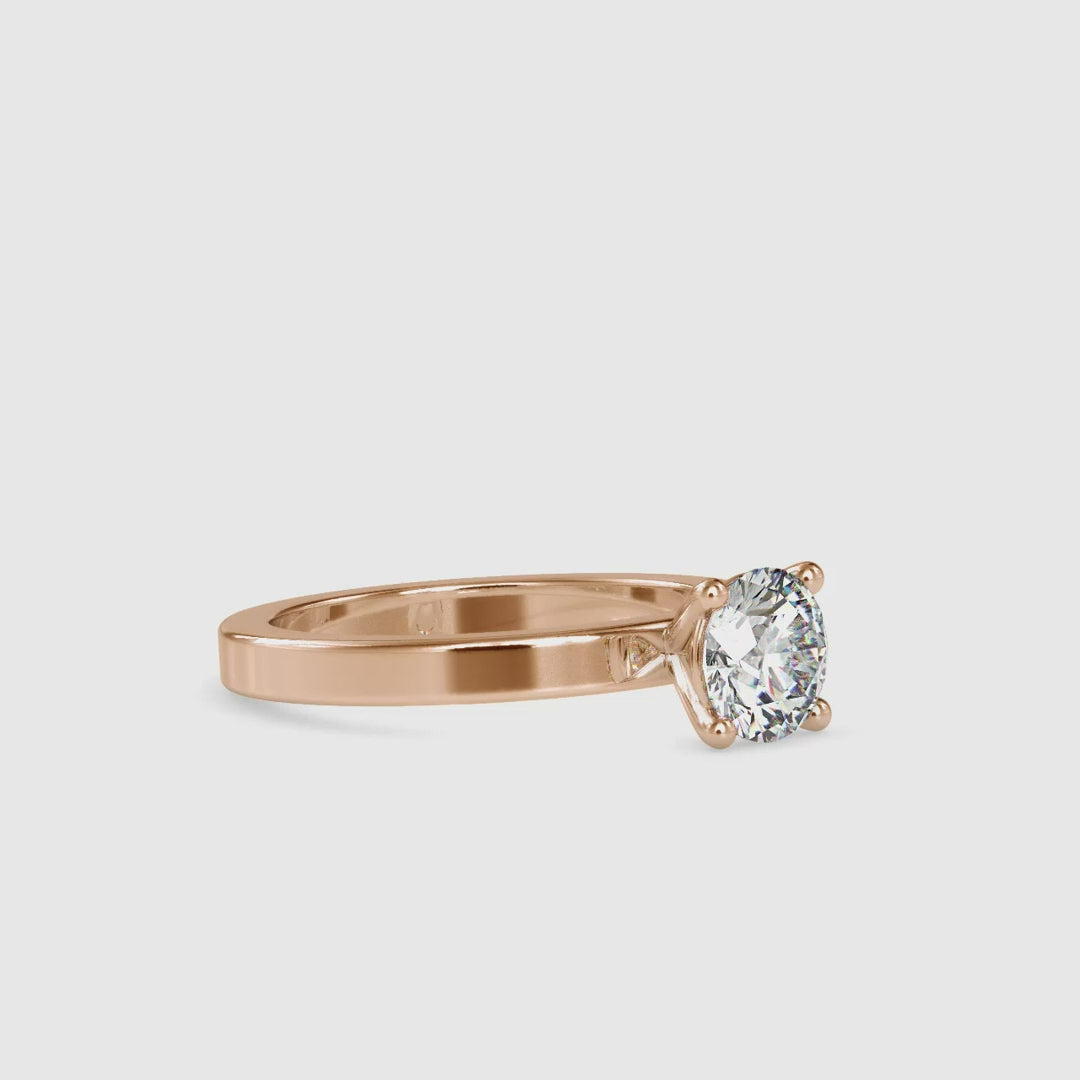 Diamondrensu UK engagement ring in rose gold with round diamond.