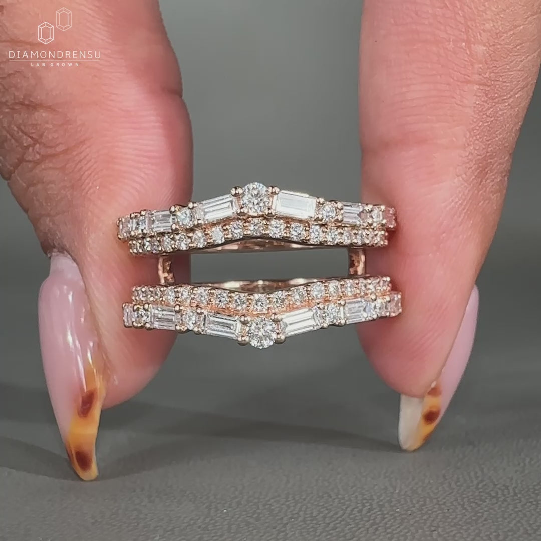 Baguette and round diamond band with prong setting.