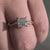 Handmade ring with a claw prong setting and a stunning princess cut engagement ring design.