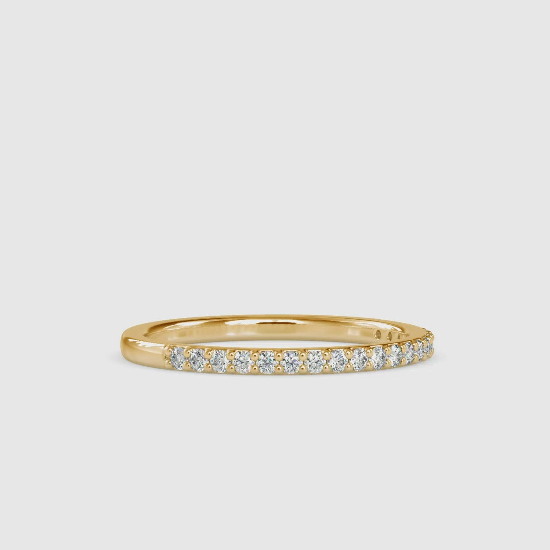 Custom half eternity wedding band with lab diamonds.