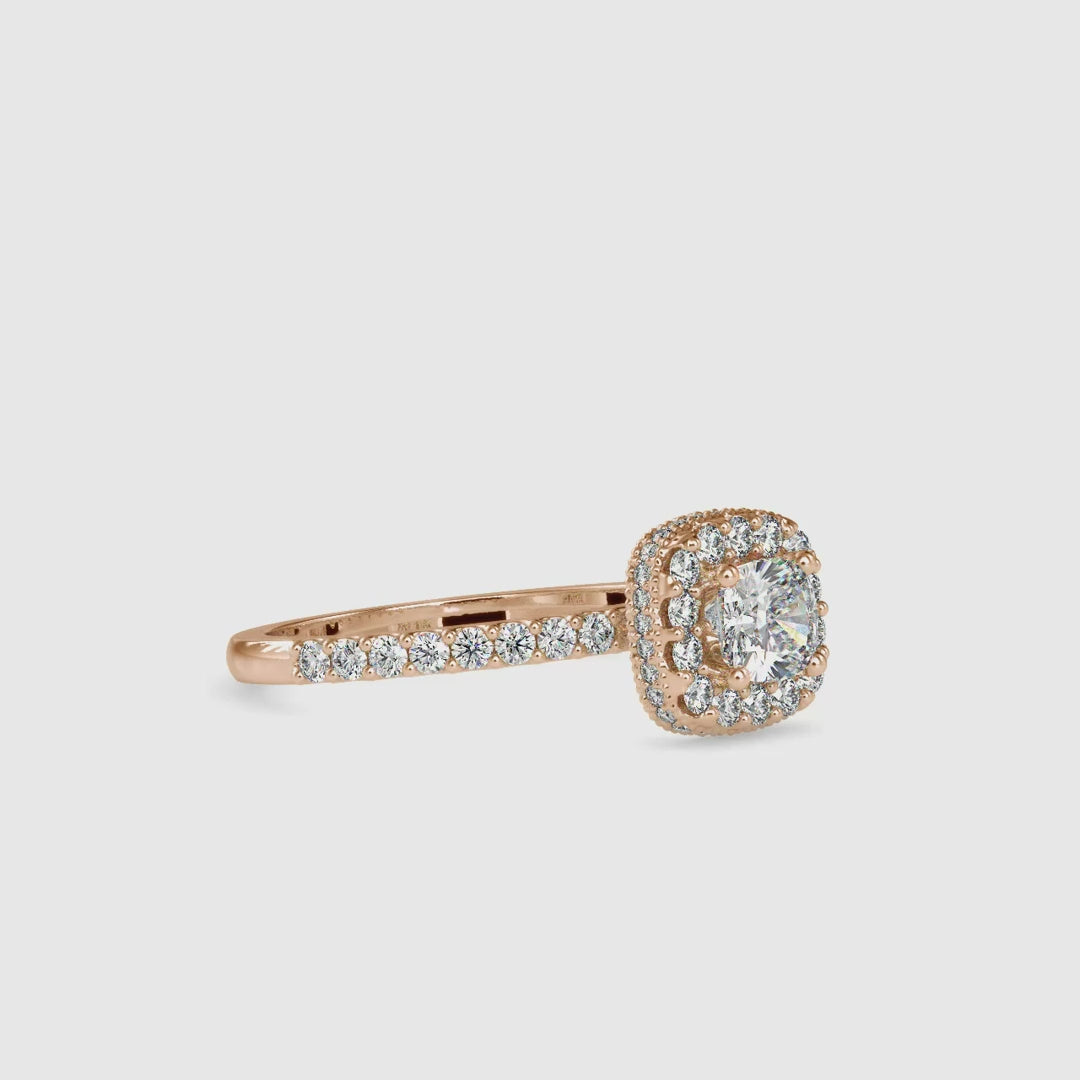 Diamondrensu UK engagement ring with cushion centre and 4 prong mount.