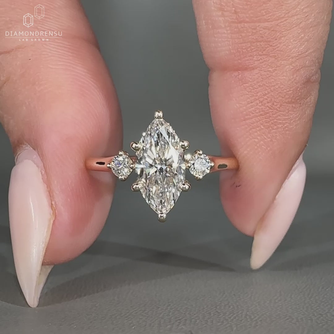 Six round prong setting marquise diamond ring