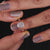 Handmade jewellery featuring a round diamond for a unique look.