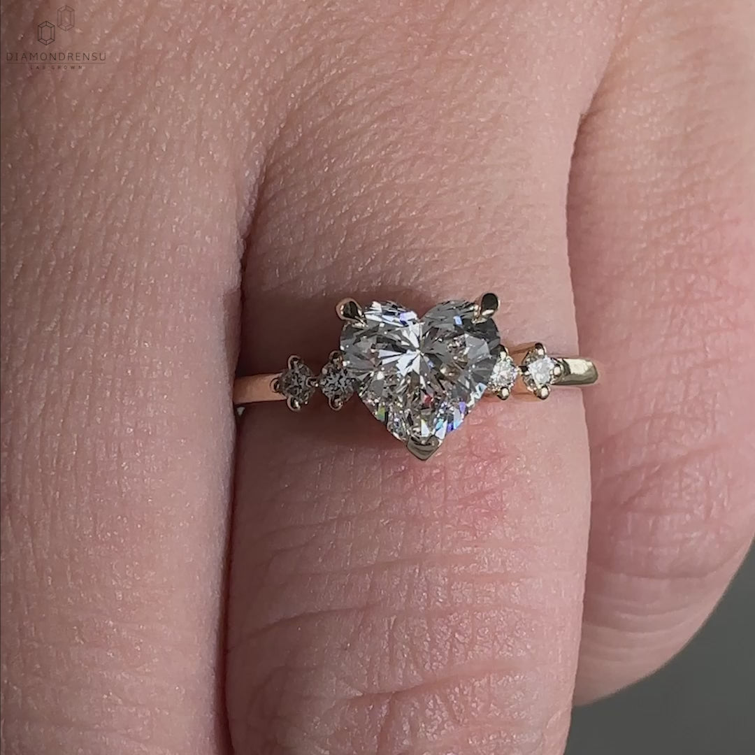 Engagement ring for women with a unique heart diamond shape and diamondrensu UK ring style.