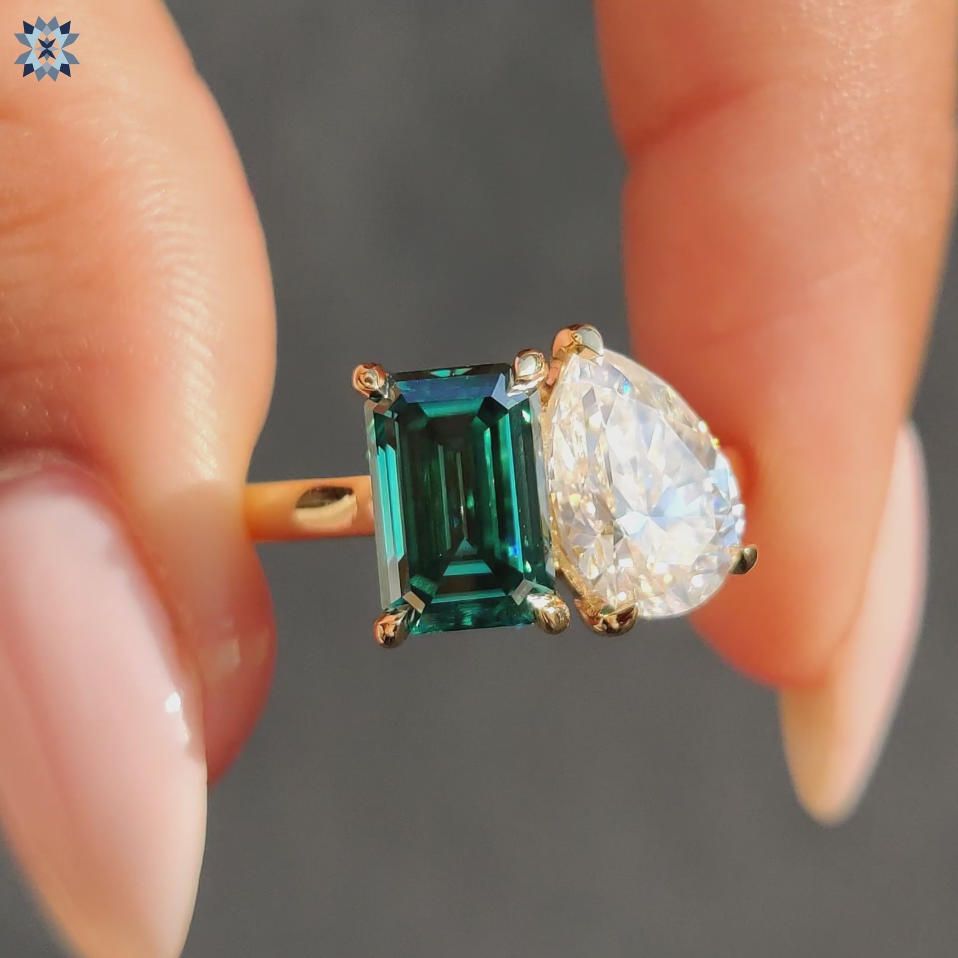 Emerald engagement ring with toi et moi ring