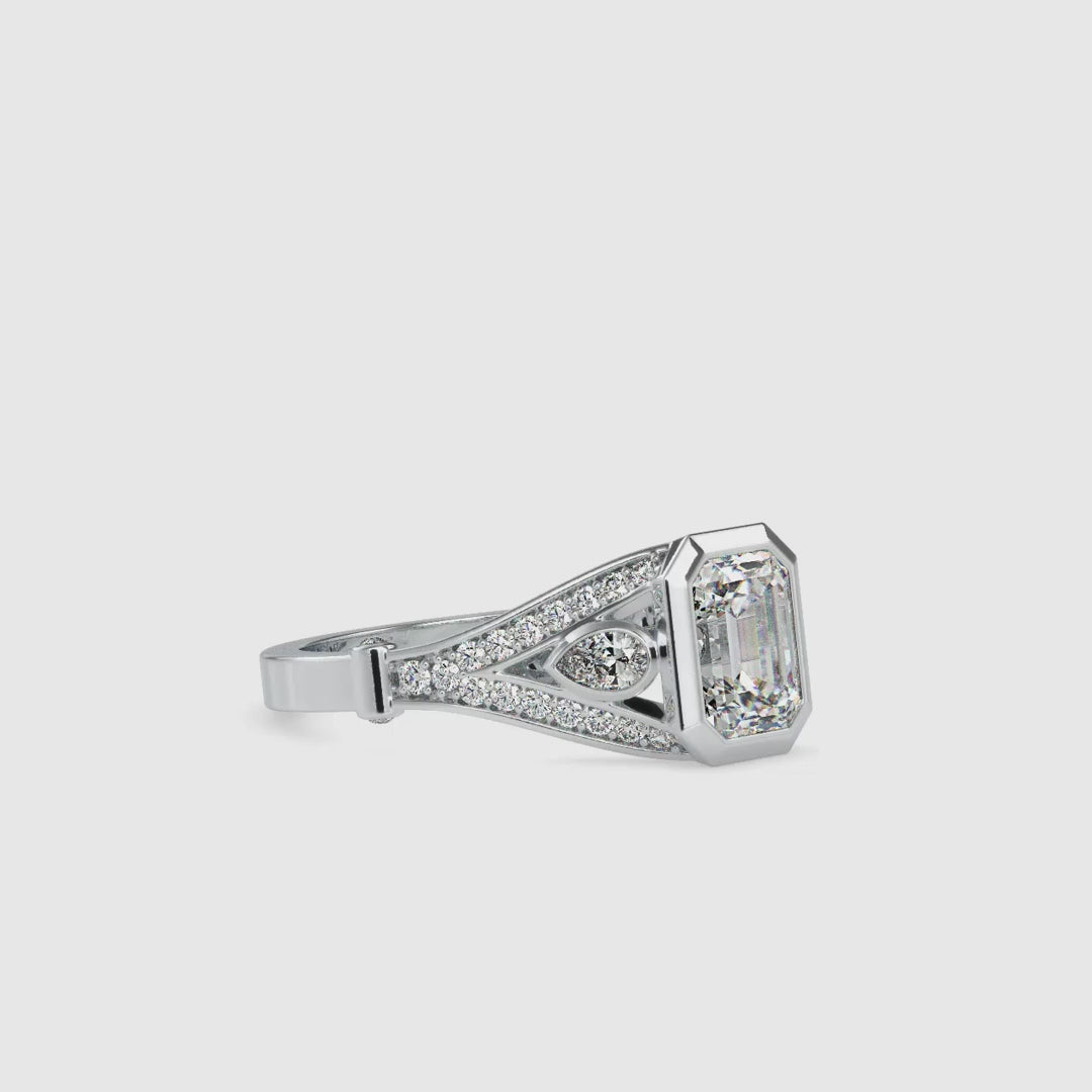 Diamondrensu UK ring with handmade emerald cut diamond.