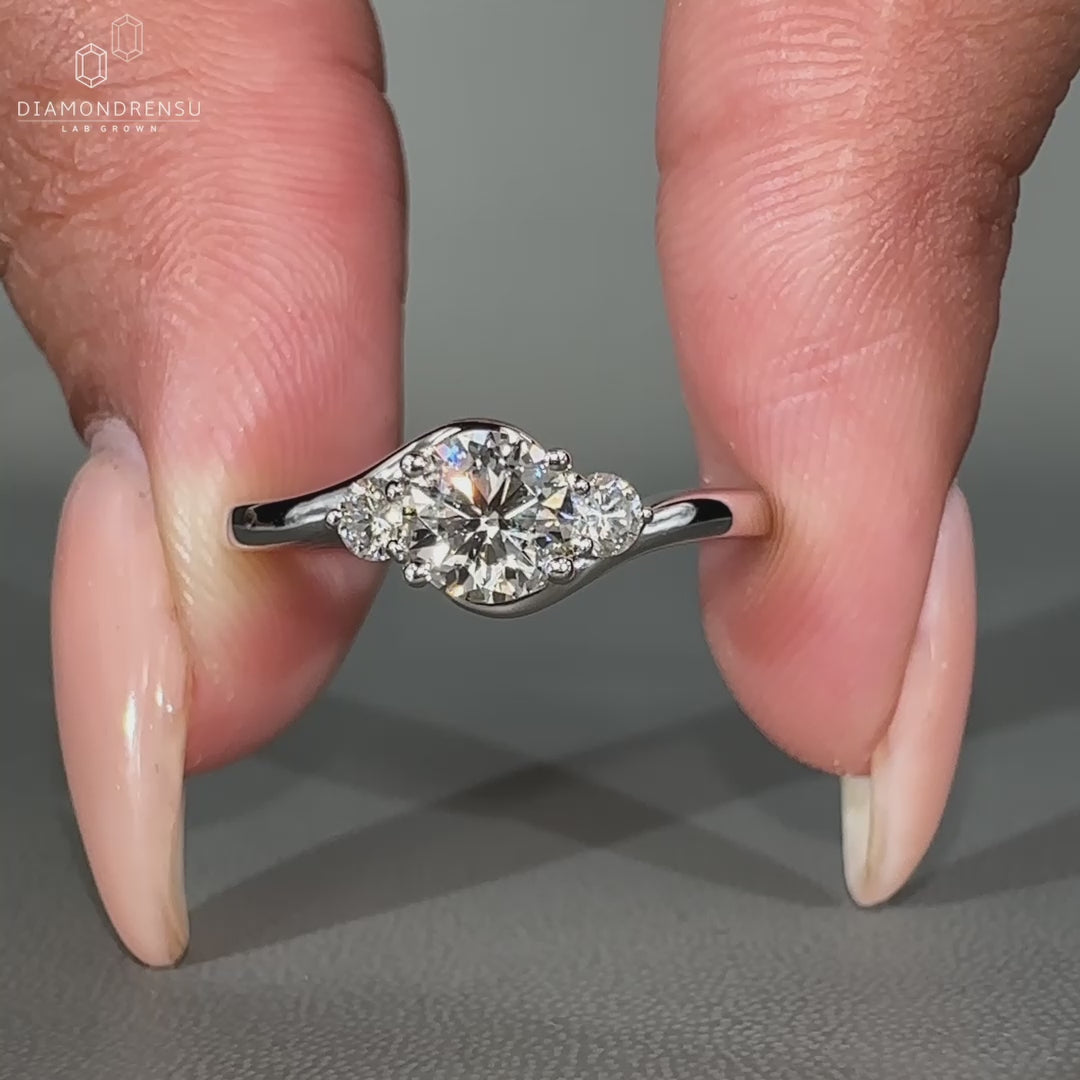 Round cut diamond ring featuring a classic prong setting.