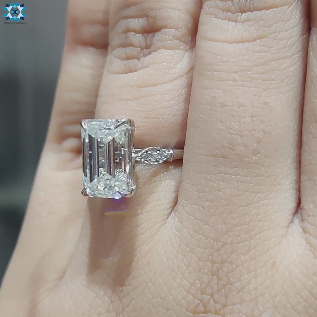 Milgrain detailed engagement ring in white gold.