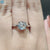Custom engagement ring with round rose cut moissanite.