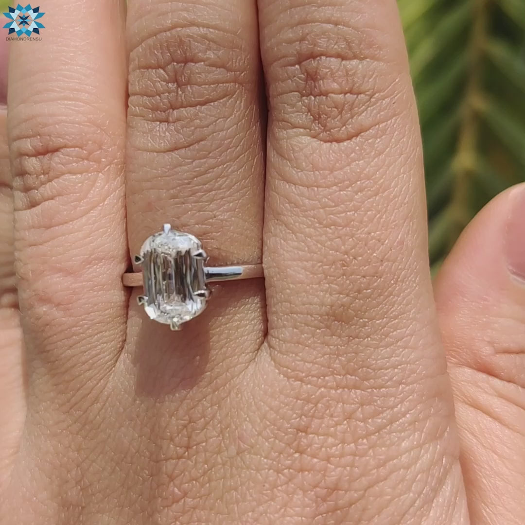 Diamondrensu UK criss cut moissanite engagement ring.